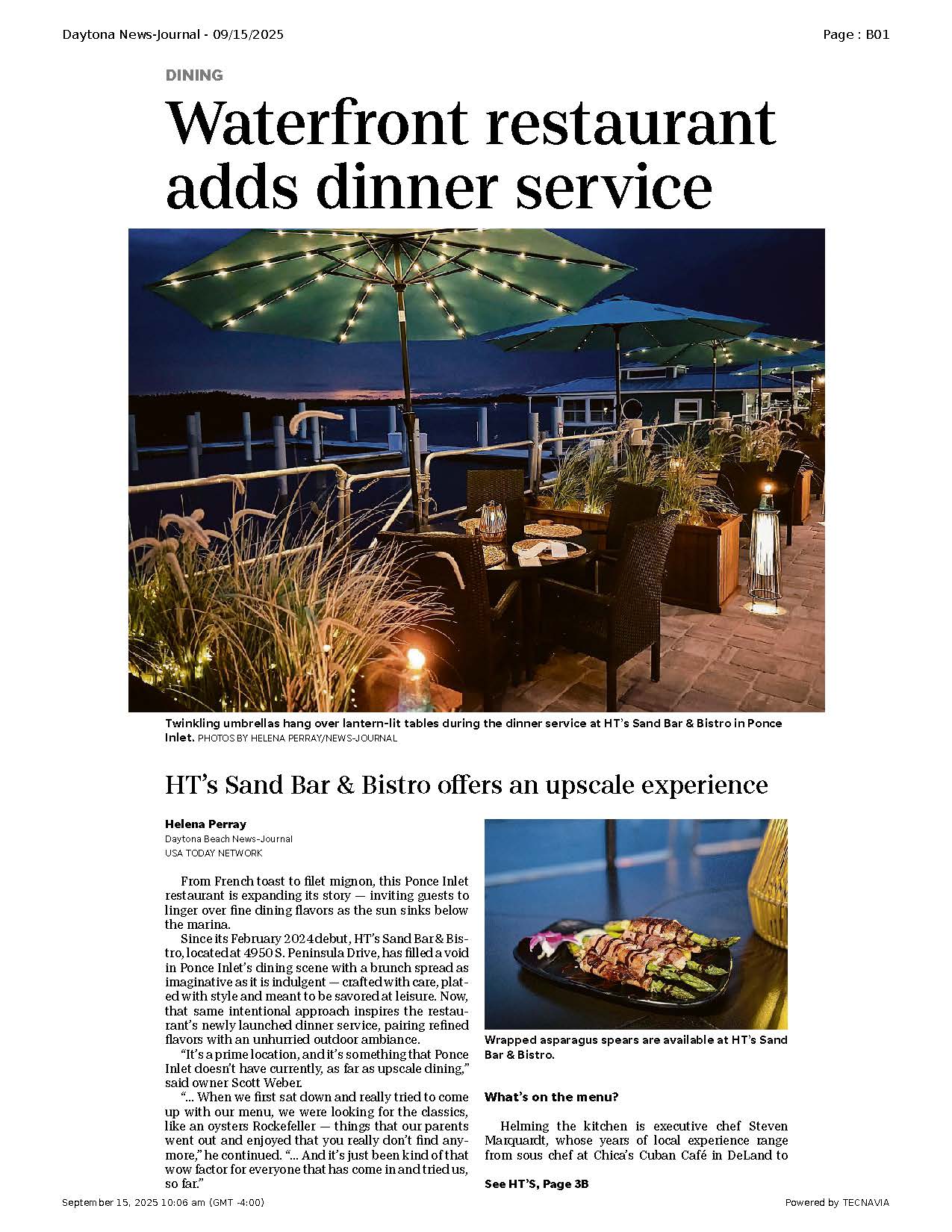 Lantern-lit outdoor waterfront dining area at sunset